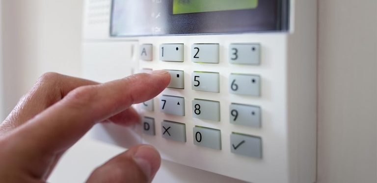 Someone typing into home security system