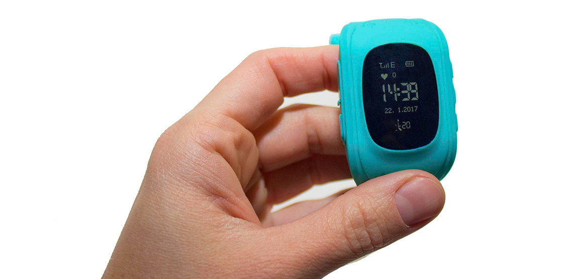 Person holding GPS tracking smart watch