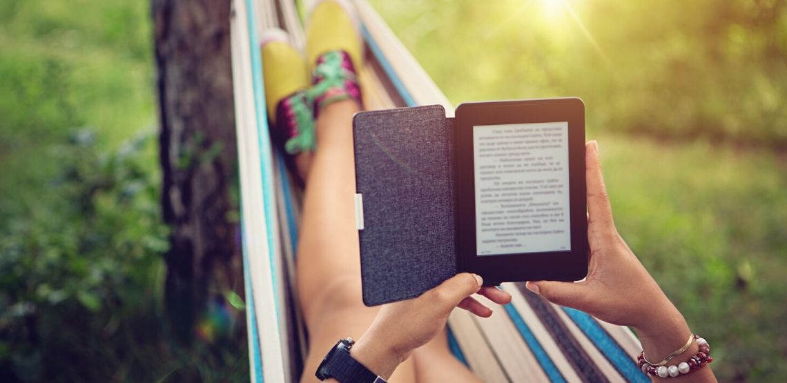 Someone reading a book on their Kindle.